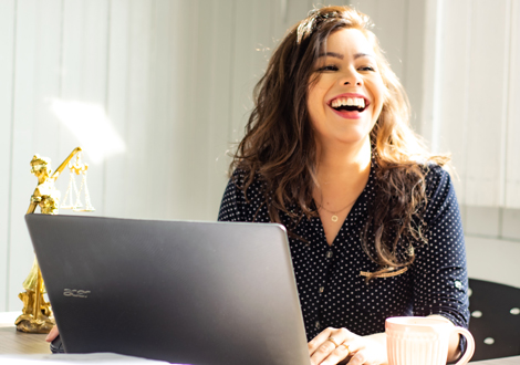 Lawyer at desk smiling